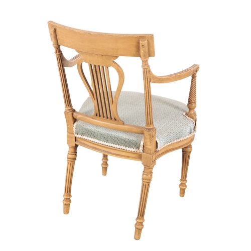 192 - A GEORGE III STYLE PAINTED ARMCHAIR 20th century, with a pierced lyre back, over a bowfront seat, on... 