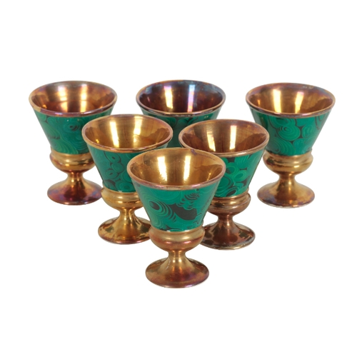 195 - A SET OF SIX PORTMEIRION MALACHITE DRINKING CUPS 20th century, each with gilt interior, on turned st... 