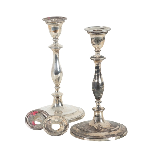 2 - A PAIR OF SILVER CANDLESTICKS BY JOHN YOUNGE & SONS Sheffield, 1799, the baluster turned stems to a ... 