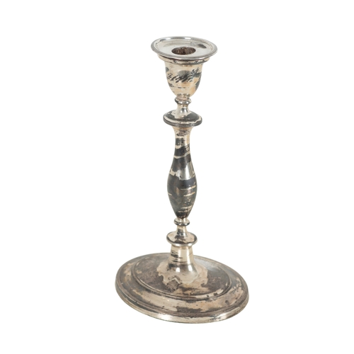 2 - A PAIR OF SILVER CANDLESTICKS BY JOHN YOUNGE & SONS Sheffield, 1799, the baluster turned stems to a ... 