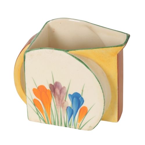 207 - CLARICE CLIFF, A CROCUS PATTERN CHAMBER STICK 15cm wide, together with a further small collection of... 