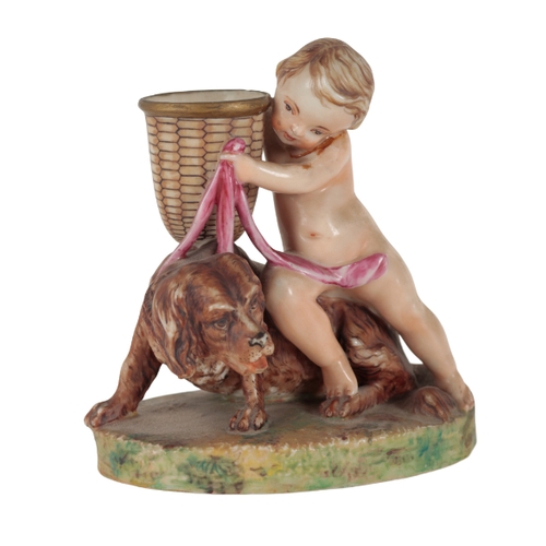 229 - A ROYAL WORCESTER BONE CHINA FIGURE OF A STANDING PUTTI WITH BASKET AND DOG 14cm high (repaired); an... 