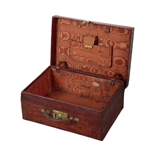 48 - A CROCODILE TRAVEL CASE the lid initialled 