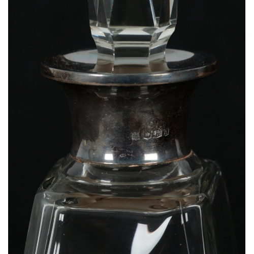 6 - A 20TH CENTURY SILVER COLLARED DECANTER BY JAMES DEAKIN & SONS Sheffield, 1925, 30.5cm high, togethe... 