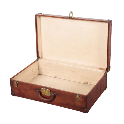 60 - LOUIS VUITTON: A LEATHER TRAVEL CASE circa 1920, the brass lock inscribed 