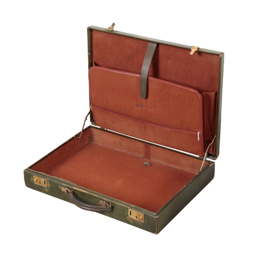 64 - A GREEN LEATHER BRIEFCASE 1970's, with brown suede interior, brass locks; a brown leather instrument... 