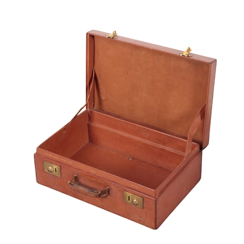 70 - CARTIER: A BROWN LEATHER OVERNIGHT CASE registration no. 732104, with ownersâ details inscribed to... 