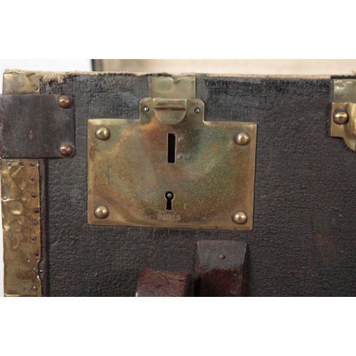 71 - MALLE LAVOLAILLE, PARIS: A CANVAS AND LEATHER, BRASS AND WOOD-BOUND TRUNK with leather carrying stra... 