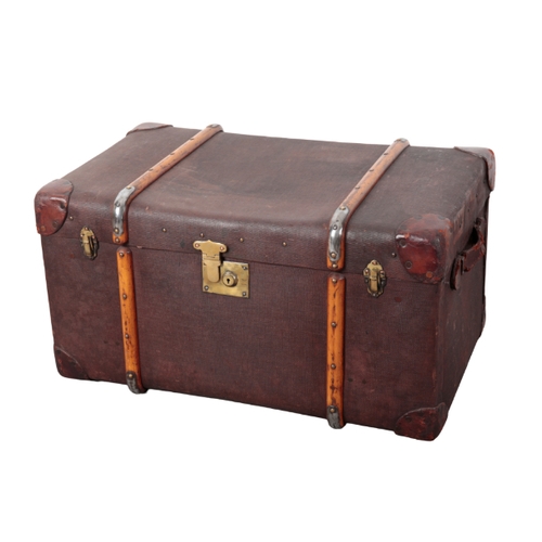 73 - AN EDWARDIAN DARK WOOD AND BRASS-BOUND TRAVELLING TRUNK with double leather carrying handles, 48cm x... 