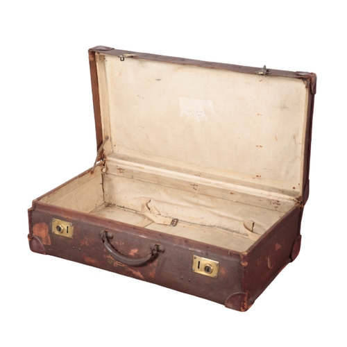 83 - AN EDWARDIAN BROWN LEATHER MASONIC SUITCASE with nickel lock fittings; a canvas and leather single g... 