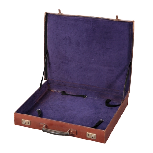 83 - AN EDWARDIAN BROWN LEATHER MASONIC SUITCASE with nickel lock fittings; a canvas and leather single g... 