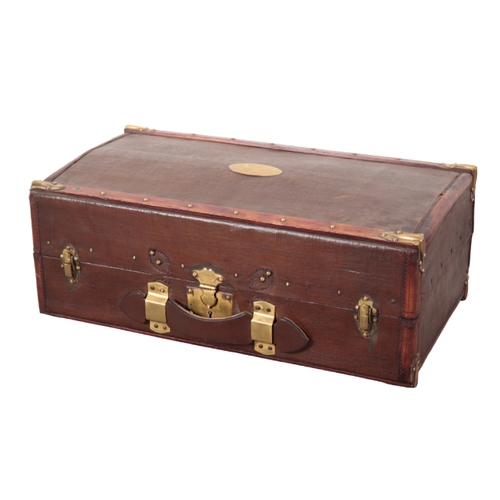 84 - LES HIRONDELLES: A FLAXITE DOMED SUITCASE with brass and wooden fittings, brass oval name plaque; an... 