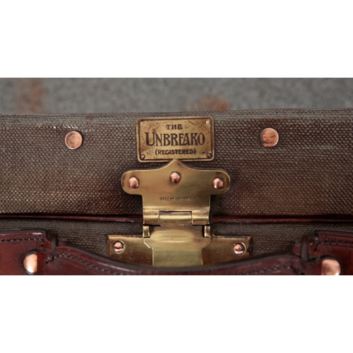 84 - LES HIRONDELLES: A FLAXITE DOMED SUITCASE with brass and wooden fittings, brass oval name plaque; an... 