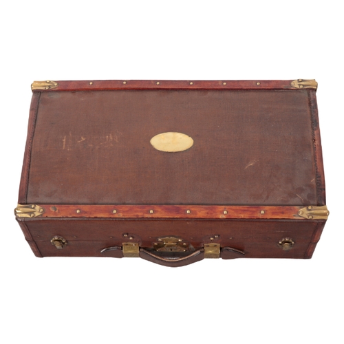 84 - LES HIRONDELLES: A FLAXITE DOMED SUITCASE with brass and wooden fittings, brass oval name plaque; an... 