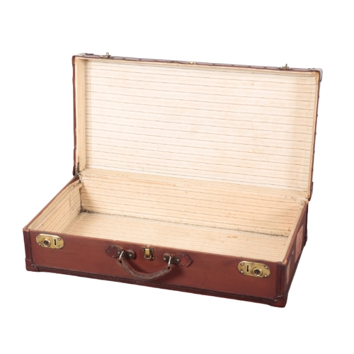 87 - AN EDWARDIAN LIGHT BROWN LEATHER-EFFECT SUITCASE with brass corners and locks; and a dark brown leat... 