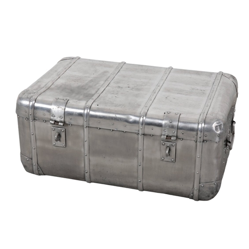 88 - TWO ALUMINIUM TRUNKS including a rounded example, with damaged clasps, 34cm high x 76cm wide x 52cm ... 