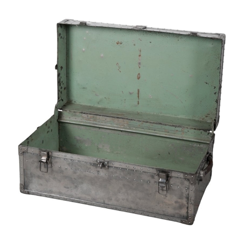 88 - TWO ALUMINIUM TRUNKS including a rounded example, with damaged clasps, 34cm high x 76cm wide x 52cm ... 