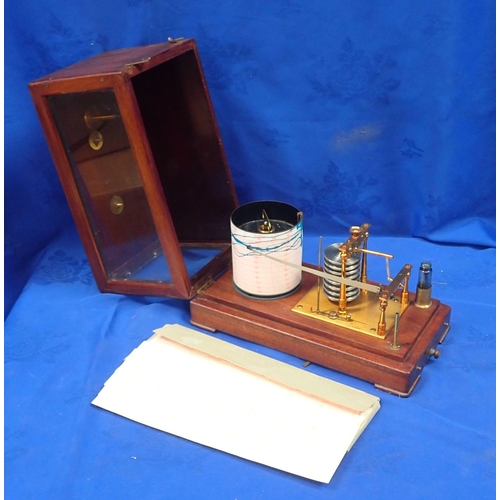 110 - AN EARLY 20TH CENTURY BAROGRAPH by Reynolds, Son & Wardale, with spare papers 32cm wide