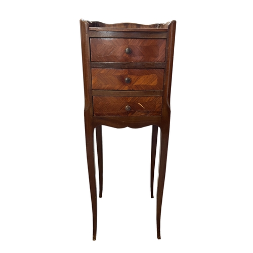 352 - A PAIR OF EDWARDIAN MAHOGANY BEDSIDE TABLES with inverted bow fronts, the two short drawers above sl... 