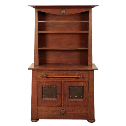 AN ARTS AND CRAFTS OAK DRESSER possibly Glasgow School, the shaped