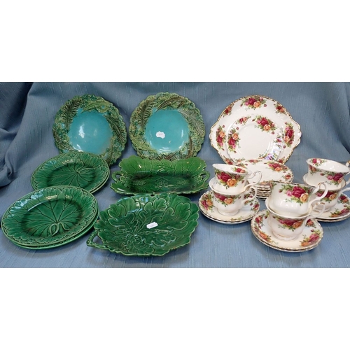 114 - ROYAL ALBERT OLD COUNTRY ROSES a part tea service, with a group of green glazed majolica plates, by ... 