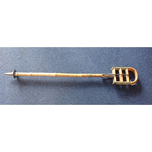 122 - A CANE AND BRASS FOLDING SHOOTING STICK