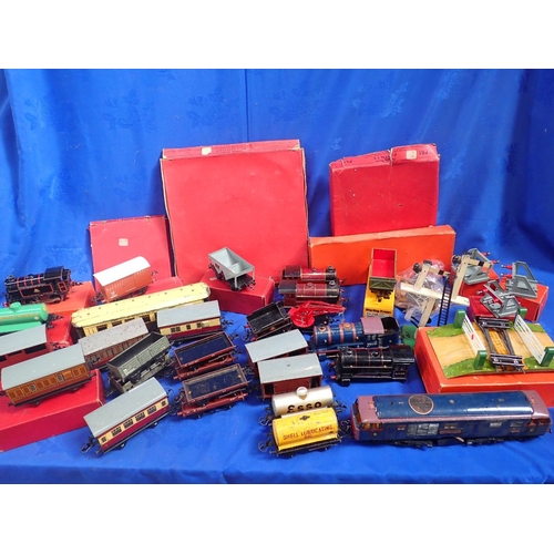 174 - A COLLECTION OF HORNBY 'O' GAUGE MODEL RAILWAY clockwork locomotives, rolling stock, accessories and... 