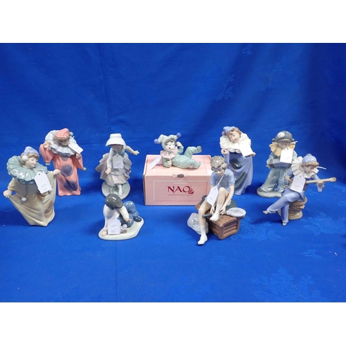 50 - A COLLECTION OF NAO (LLADRO) FIGURINES various subjects and themes, one boxed