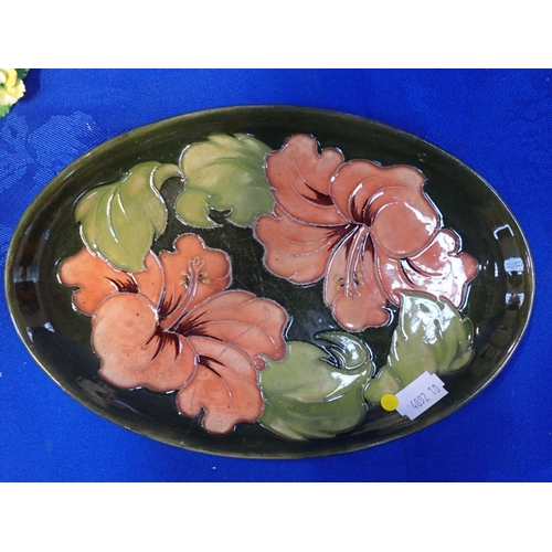 110 - A MOORCROFT HIBISCUS OVAL DISH 23cm (damaged), a pair of Luneville candlesticks (one a/f), and other... 