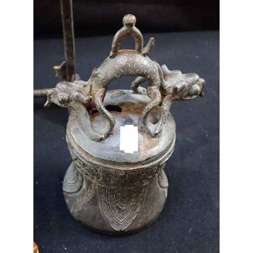 145 - A TIBETAN TEMPLE BELL WITH STAND (stand very rickety and no striker in bell), a prayer wheel, a set ... 