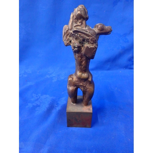 154 - A MODERNIST BRONZE SCUPTURE OF A MAN ON SQUARE BASE indistinctly signed 31cm high