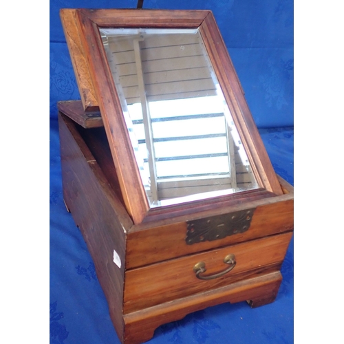 161 - AN ASIAN DRESSING BOX WITH DRAWER, AND HINGED MIRRORED LID and decorative metal mounts 23 x 34cm