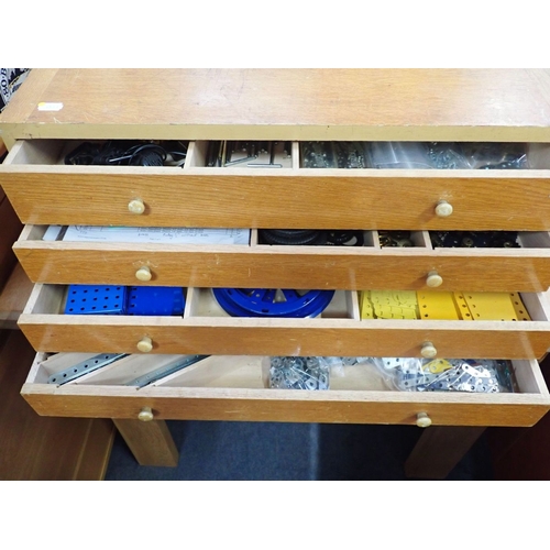 172 - A MECCANO OUTFIT NO. 10 FOUR-DRAWER CHEST in light oak with knobs, with extensive contents (note: th... 