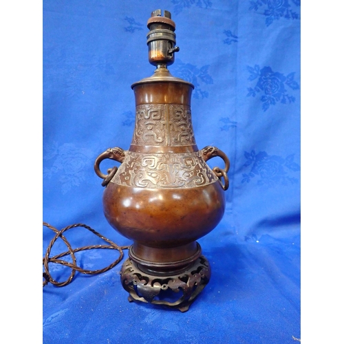 228 - A CHINESE BRONZE TABLE LAMP BASE 36cms height