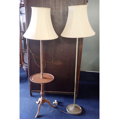 229 - A BRASS STANDARD LAMP and a combined tripod table/standard lamp, (2)