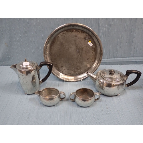 247 - A LIBERTY 'TUDRIC'  PLANISHED PEWTER TEA SET, NUMBERED 01535 of squat form, brightly polished  early... 