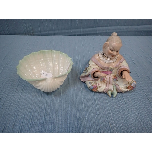 277 - A BELLEEK SHELL DISH (smudged mark), and a Victorian nodding Chinaman figure