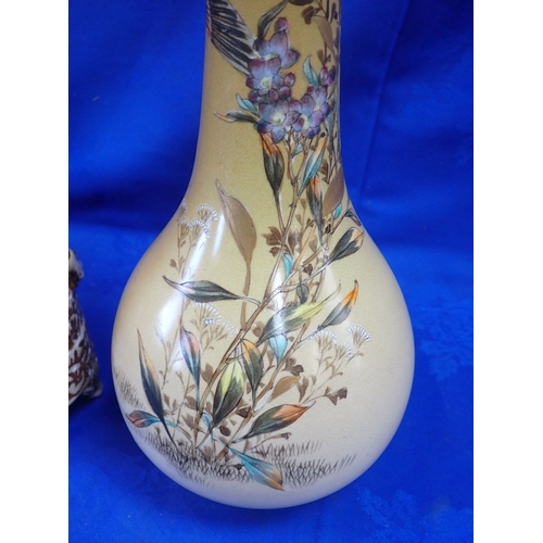 292 - THREE EARLY 20TH CENTURY JAPANESE VASES one with long flared neck painted with birds amongst flowers... 