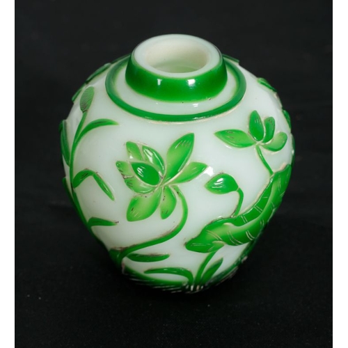 352 - A CHINESE PEKING GLASS VASE AND COVER 20th century, with green sprouting flowers on a white ground, ... 