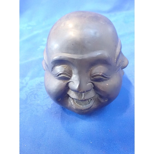 364 - A FOUR-FACED PATINATED BRONZE BUDDHA