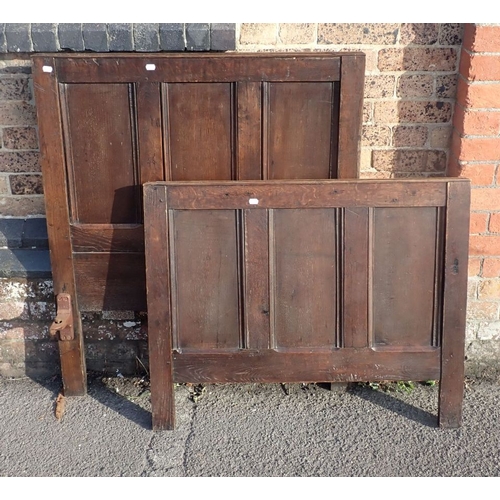 812 - AN OAK PANELLED SINGLE BED made from 18th century panelling (with iron rails)