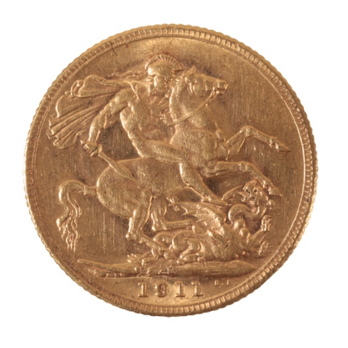 14 - A 1911 GEORGE V GOLD SOVEREIGN the reverse of St. George and the Dragon (c.7.95grams)