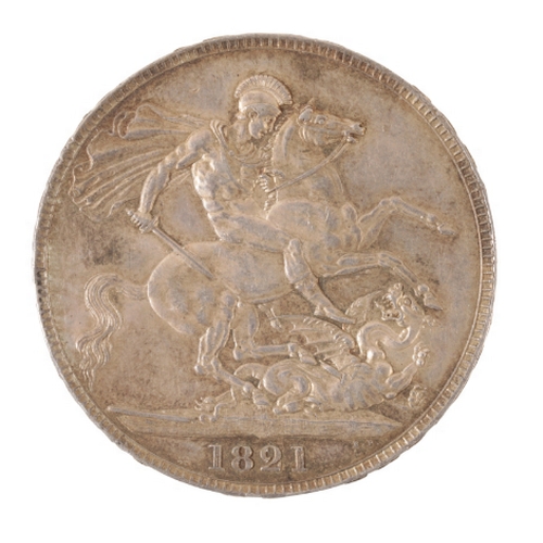 142 - AN 1821 GEORGE IV SILVER CROWN the reverse with St. George and the Dragon