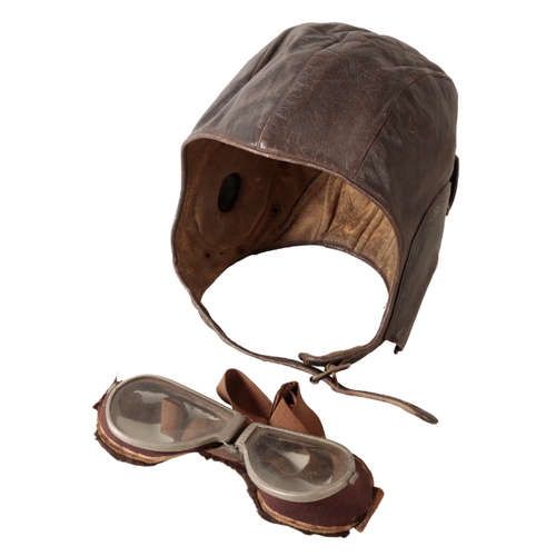 236 - CIVIL FLYING HELMET AND GOGGLES named to a F M Jarrett, possibly KIA 1941. 

Inside written F M Jarr... 