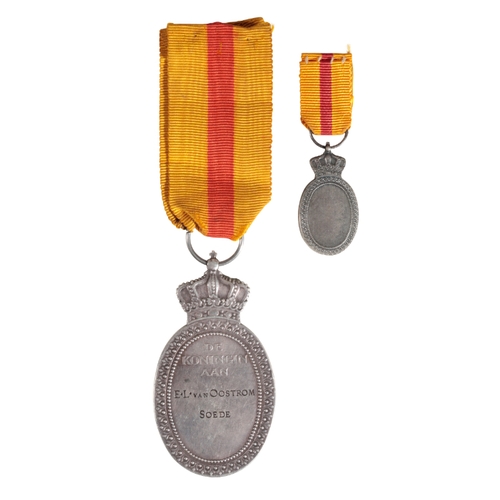 376 - DUTCH HONORARY MEDAL FOR CHARITABLE ASSISTANCE Full size silver example engraved on the reverse to '... 