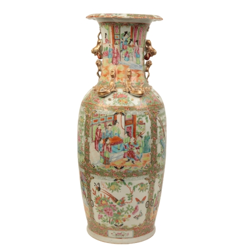 101 - A CANTONESE FAMILLE ROSE VASE Qing, enamelled in polychrome with panels of flowers, birds, butterfli... 