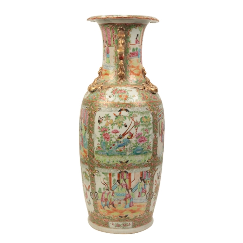 101 - A CANTONESE FAMILLE ROSE VASE Qing, enamelled in polychrome with panels of flowers, birds, butterfli... 