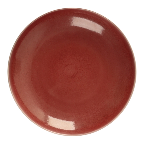 113 - A CHINESE RED GLAZED DISH Qing or later, the rich red monochrome interior fading to a lighter ground... 