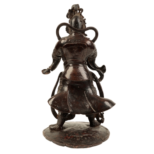 12 - A CHINESE BRONZE STANDING FIGURE OF GUANDI Ming, 16th/17th century, in full armour and elaborate hea... 