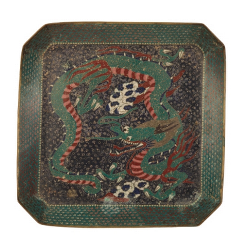 121 - A JAPANESE CLOISONNE CANTED SQUARE TRAY Edo, decorated in dark enamels with a green dragon on an ind... 